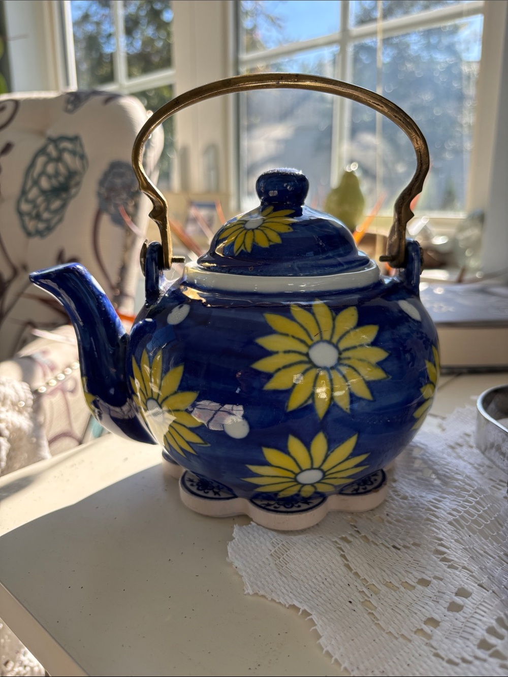 Hand-Painted Blue Ceramic Teapot with Yellow Daisy Motif